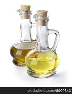 olive vegetable oil in glass pitchers isolated on white with clipping path included