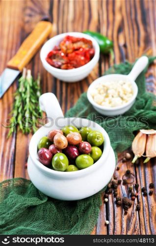 olives, cheese and dry tomato in bowl
