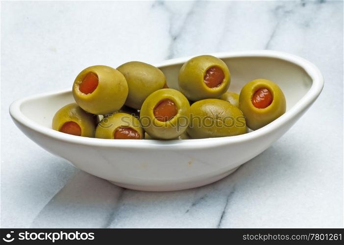 olives filled with red paste. Olive
