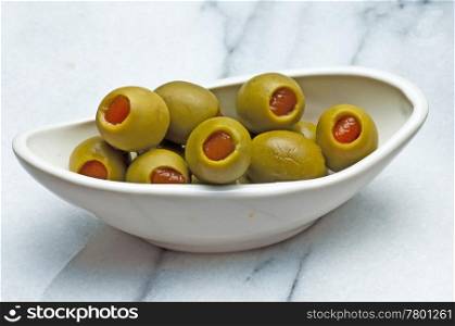 olives filled with red paste. Olive