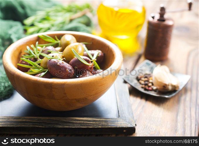 olives im bowl and oil, stock photo