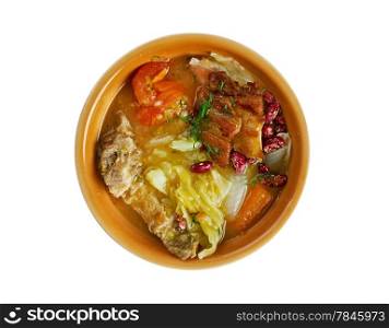 Olla podrida - Spanish stew made from pork and beans,.isolated on white