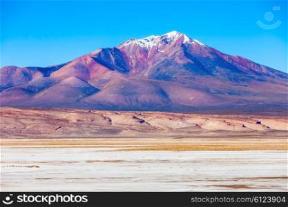 Ollague or Ullawi is a massive andesite stratovolcano in the Andes on the border between Bolivia and Chile.