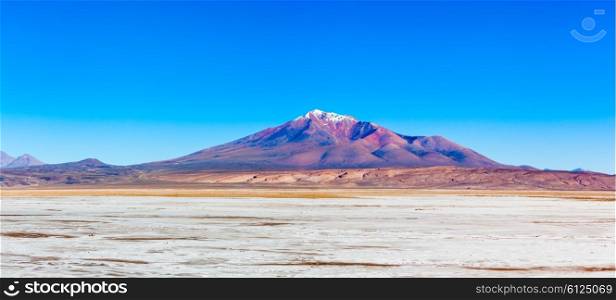 Ollague or Ullawi is a massive andesite stratovolcano in the Andes on the border between Bolivia and Chile.