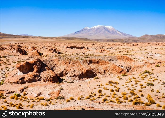 Ollague volcano is a massive stratovolcano on the border between Bolivia and Chile.