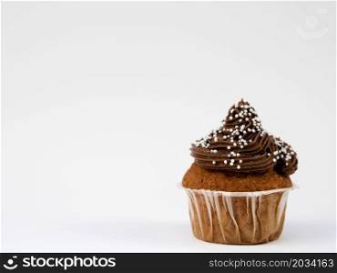 OLYMPUS DIGITAL CAMERA. close up delicious muffin white background