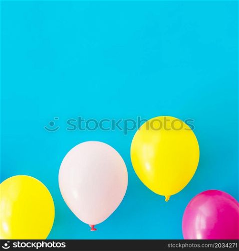 OLYMPUS DIGITAL CAMERA. colorful balloons blue background