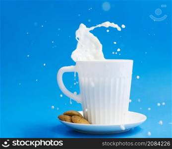 OLYMPUS DIGITAL CAMERA. cup milk with cookies