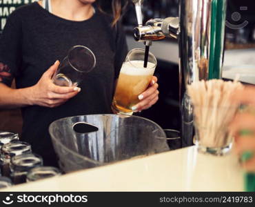 OLYMPUS DIGITAL CAMERA. female bartender pouring beer