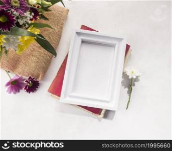 OLYMPUS DIGITAL CAMERA. flower composition frame grey desk