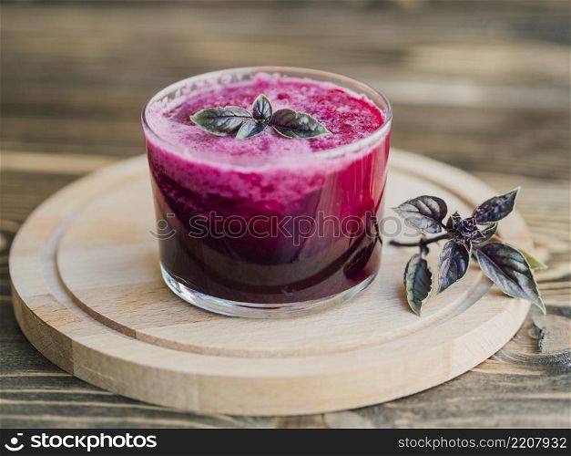 OLYMPUS DIGITAL CAMERA. fresh glass beetroot juice wooden tray