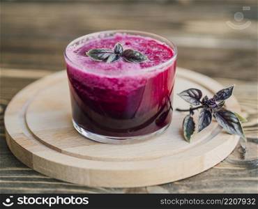 OLYMPUS DIGITAL CAMERA. fresh glass beetroot juice wooden tray