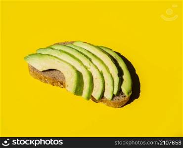 OLYMPUS DIGITAL CAMERA. healthy sliced avocado bread slice