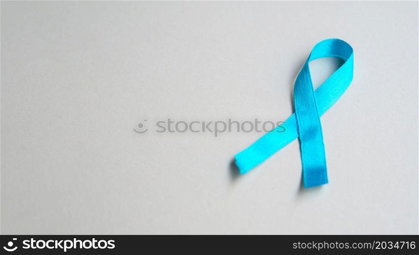 OLYMPUS DIGITAL CAMERA. high angle blue ribbon with copy space