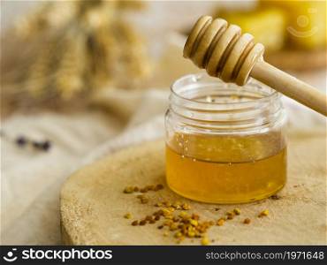 OLYMPUS DIGITAL CAMERA. High resolution photo. homemade honey jar front view. High quality photo