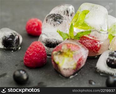 OLYMPUS DIGITAL CAMERA. ice cubes with strawberry blueberry raspberry