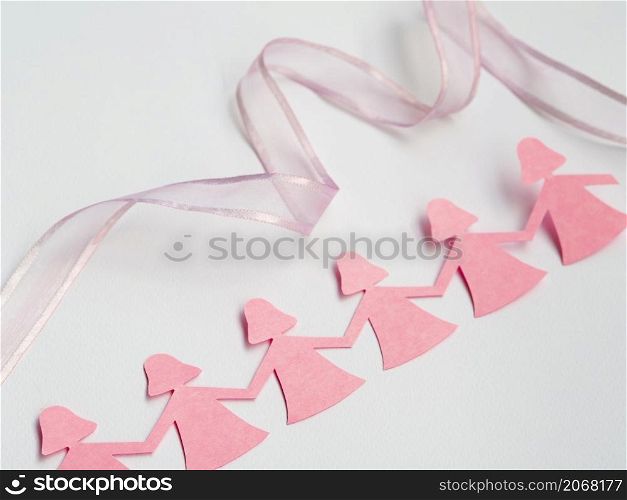 OLYMPUS DIGITAL CAMERA. pink paper girl holding hands