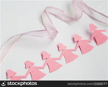 OLYMPUS DIGITAL CAMERA. pink paper girl holding hands