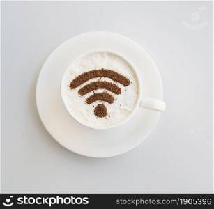 OLYMPUS DIGITAL CAMERA. wifi symbol drawn cup plain background