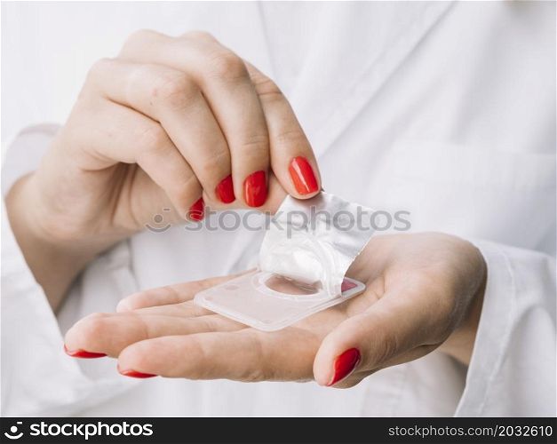 OLYMPUS DIGITAL CAMERA. woman unboxing new contact lenses