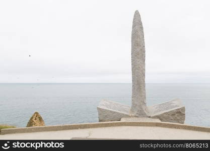 OMAHA BEACH, FRANCE - AUGUST 07, 2016: Monument at Pointe du Hoc. Omaha beach is located on the coast of Normandy, France, facing the English Channel.