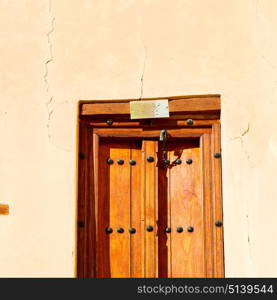 oman old wooden door and wall in the house