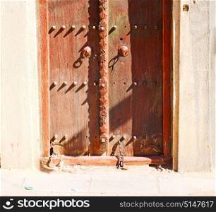 oman old wooden door and wall in the house