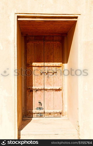 oman old wooden door and wall in the house