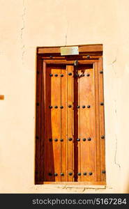 oman old wooden door and wall in the house