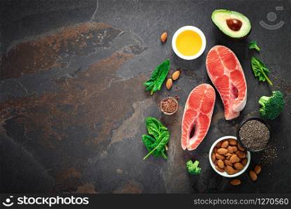 Omega-3 fats. Salmon fish and vegetarian sources of unsaturated fatty acids. Healthy food concept for good health. Top view