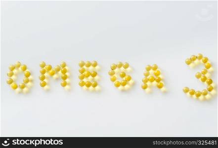 Omega-3 fish oil capsules on the white background