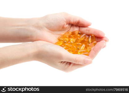 Omega 3 in female hands. Isolate on white.