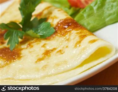 Omelet with vegetable .closeup