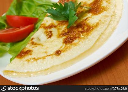 Omelet with vegetable .closeup