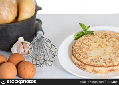 Omelette ingredients and garnished with a mint flower