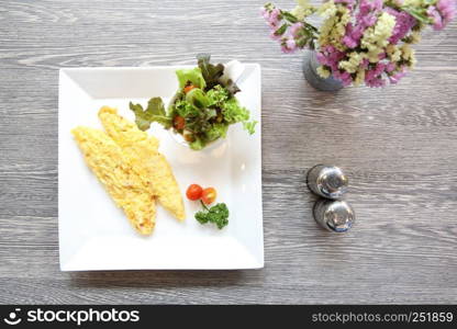 omelette on wood background