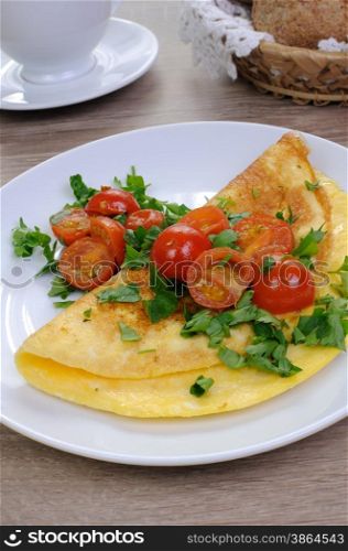 Omelette tomatoes and herbs, coffee with fresh pastries