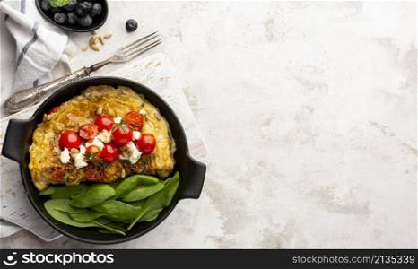 omelette with cheese tomatoes marble copy space