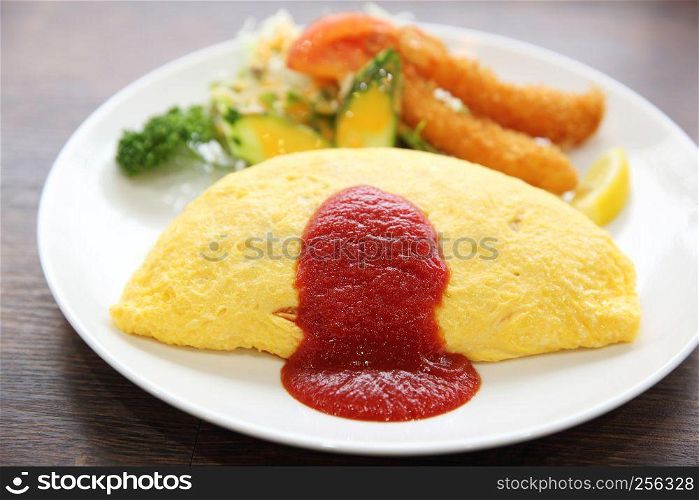 omelette with fried rice and shrimp tempura Japanese food