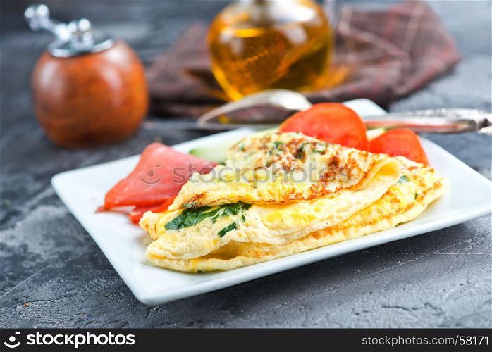 omelette with tomato on the white board