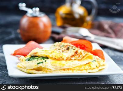 omelette with tomato on the white board