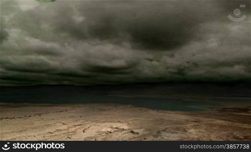 Ominous clouds and lightning over a desert plain (composited with the Dead Sea)