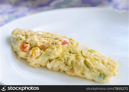 omlette. fresh omlette on white dish for morning