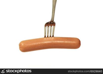 On a metal fork pinned sausage on a white background