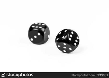 On a white background there are two dice for playing poker
