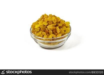 On a white background there is a glass salad bowl with dried grapes (raisins)