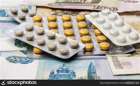 On banknotes are packing of medical drugs