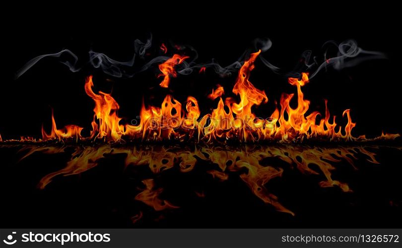 On fire flames at the black background, Burning red hot sparks rise, Fiery orange glowing flying particles