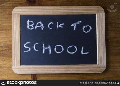On replica writing slate used in Victorian UK schools ?Back to School?.