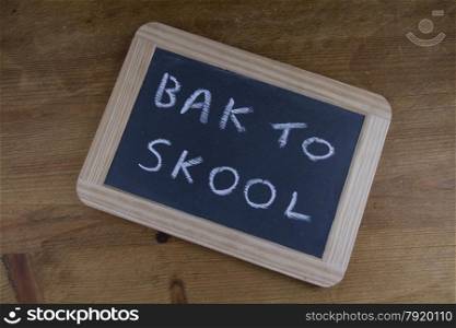 On replica writing slate used in Victorian UK schools ?Back to School?.